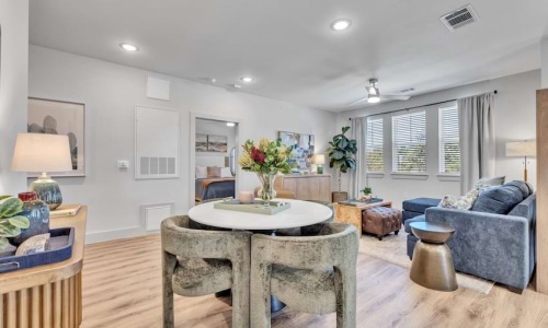 Open-concept living and dining area at Pyland Ranch