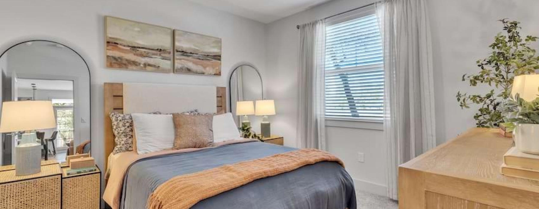 One-bedroom apartment bedroom at Pyland Ranch in San Marcos, TX
